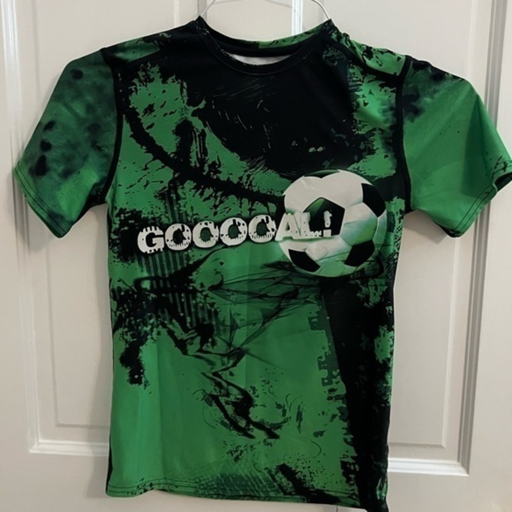 Boys BCG fitted shirt. Size Medium. Soccer